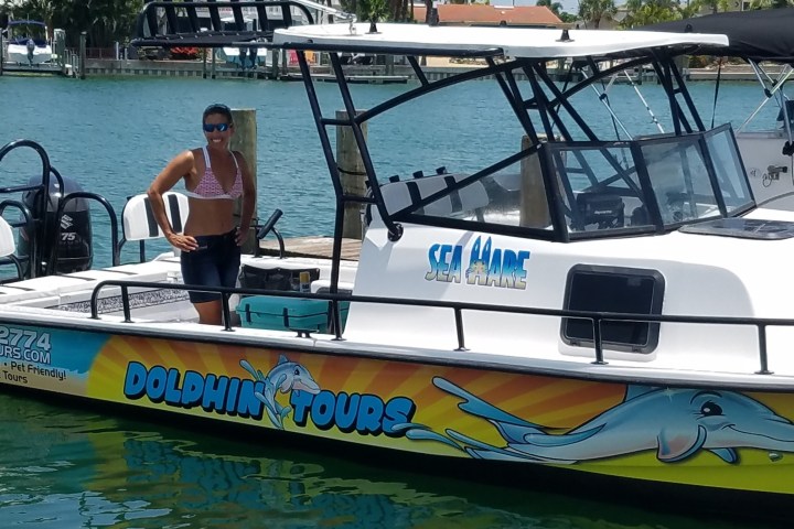 a boat is docked next to a body of water