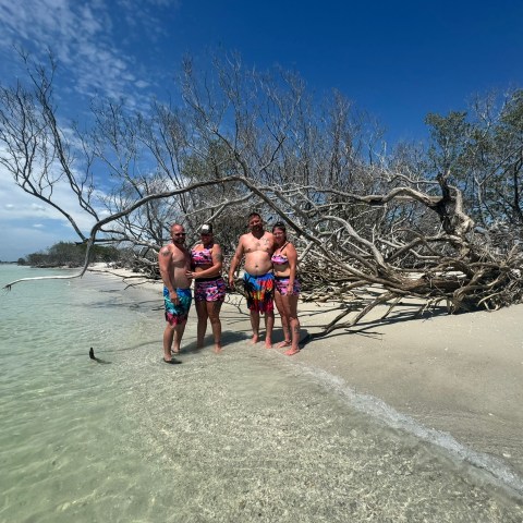 a man riding skis down a snow covered slope