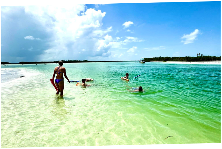 b699397b78fa8841f64facaa8147b168 a man standing next to a body of water