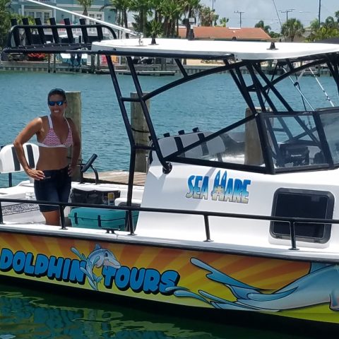a boat is docked next to a body of water